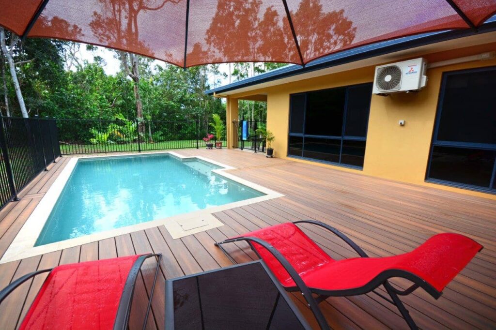 A composite pool deck and chairs